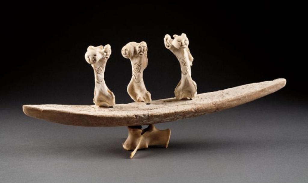 Manasie Akpaliapik (1955) - Kayak with Winged Spirit Figures, 2003, whale bone