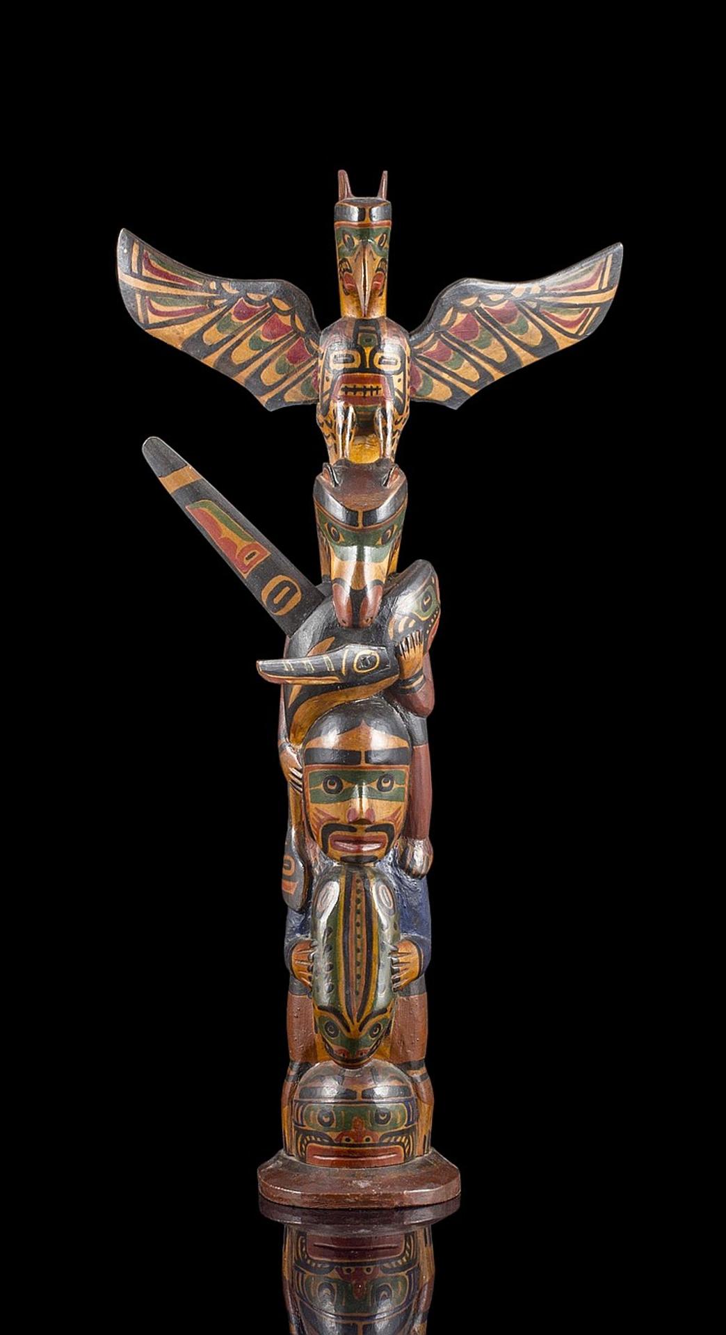 Charlie James (1865-1961) - a carved and polychromed cedar pole depicting Thunderbird