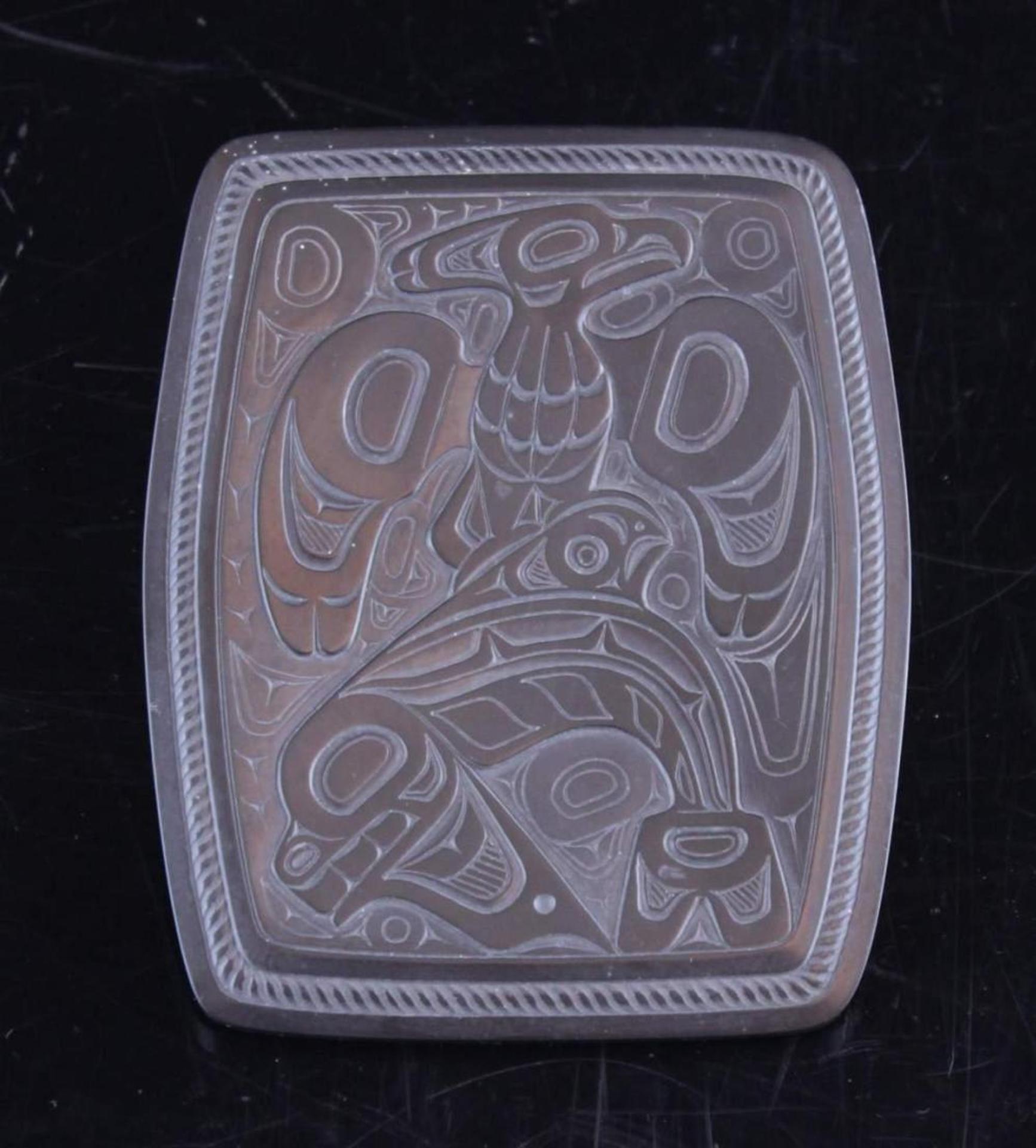 Denny Dixon (1944) - a carved rectangular argillite plaque decorated with Haida Eagle and Killer Whale design