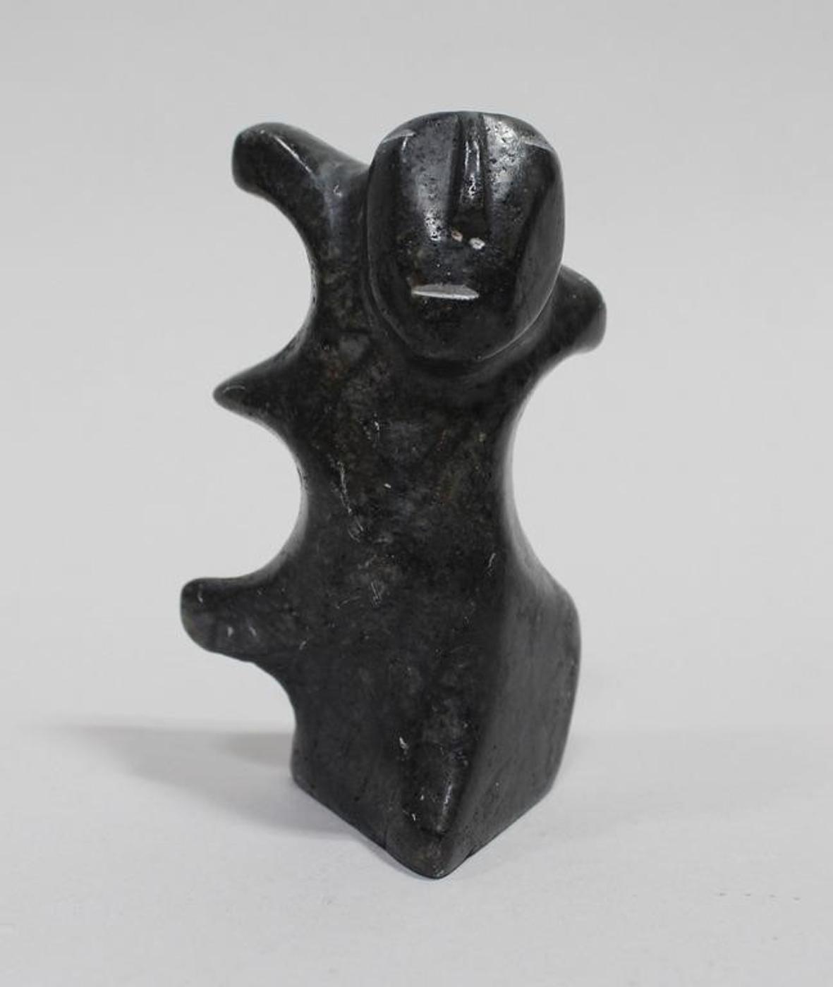 George Arlook Arluk (1949) - Black stone carving of an Abstracted Figure