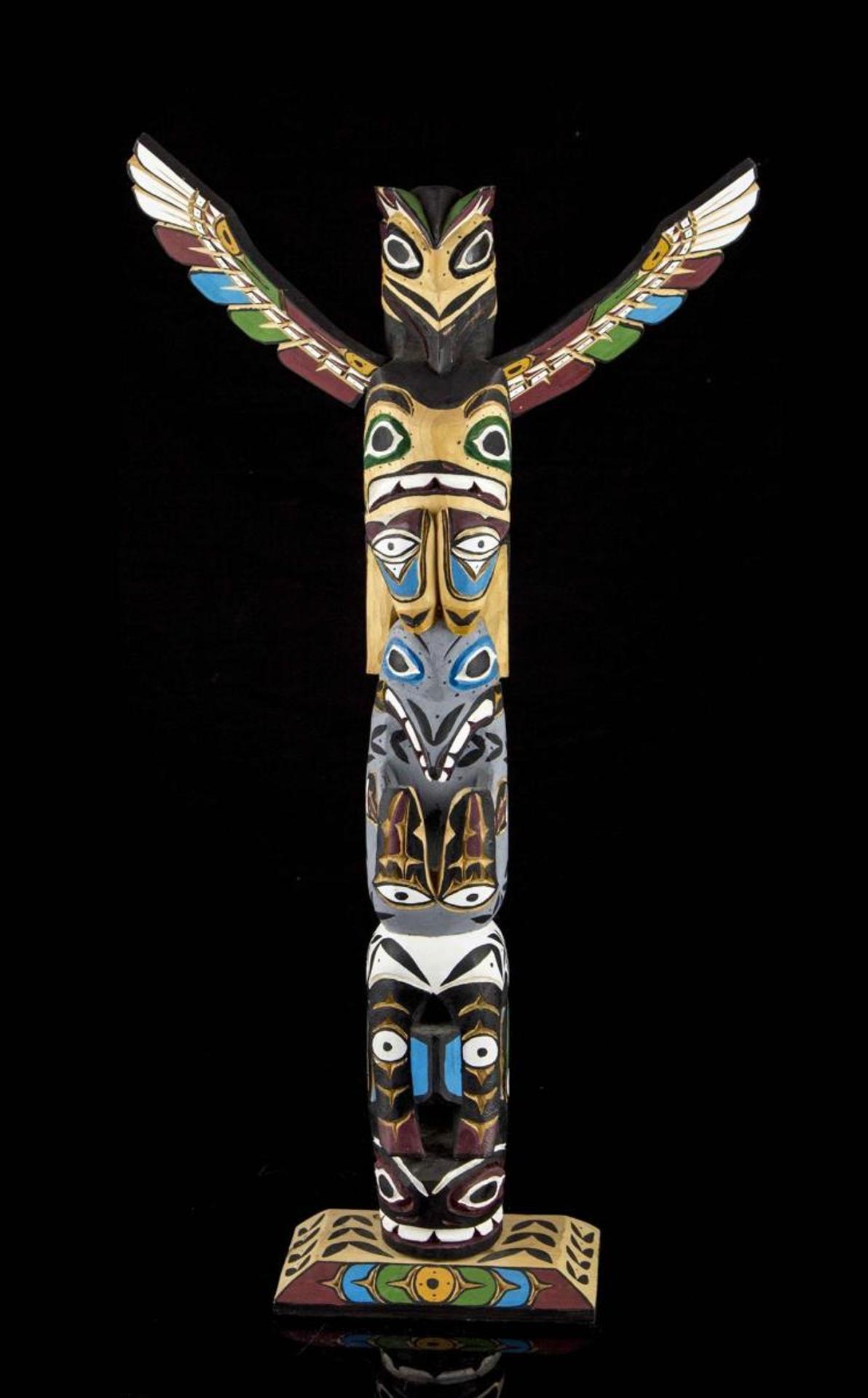 Rita Williams - a carved and polychomed totem pole