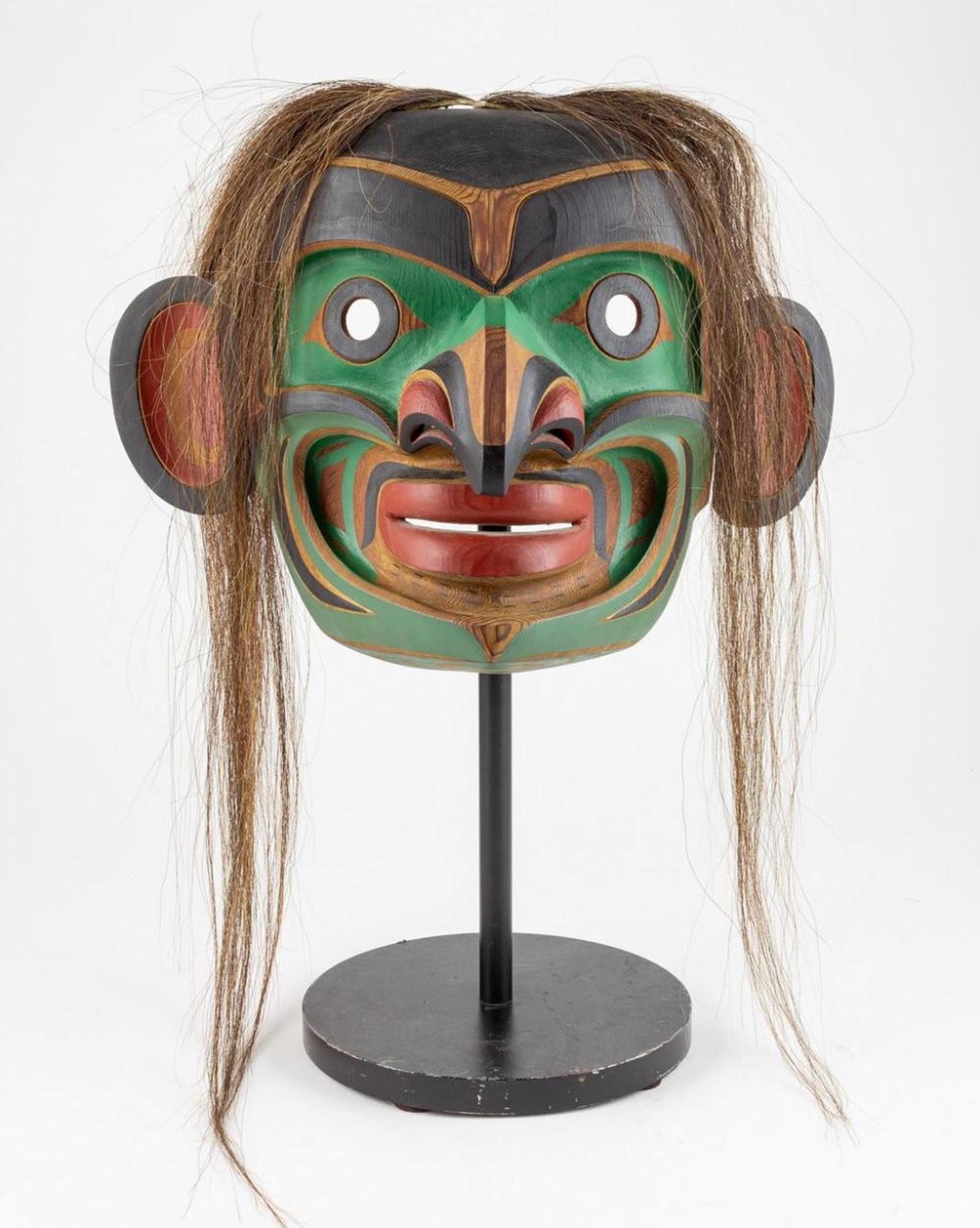 Tom Hunt (1964) - a carved and polychromed cedar Bukwus mask trimmed with hair