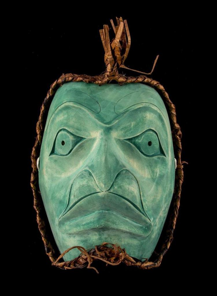 Northwest Coast - a carved and polychromed cedar Frog mask