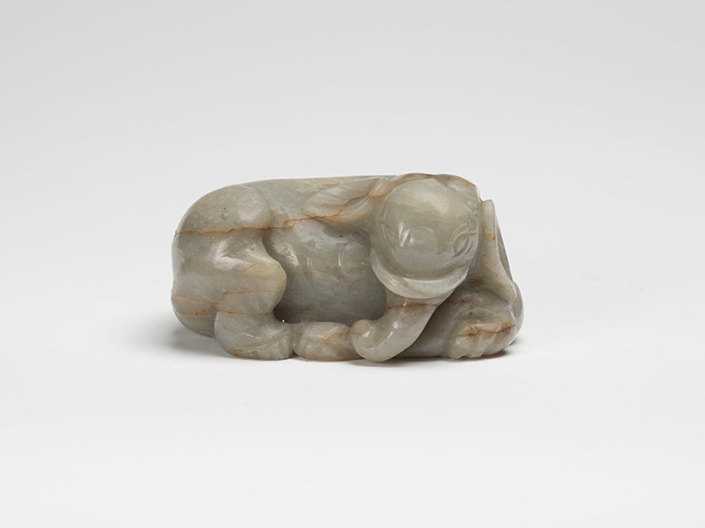 Chinese Art - A Chinese Greyish Celadon Jade Carved Recumbent Elephant, Qing Dynasty