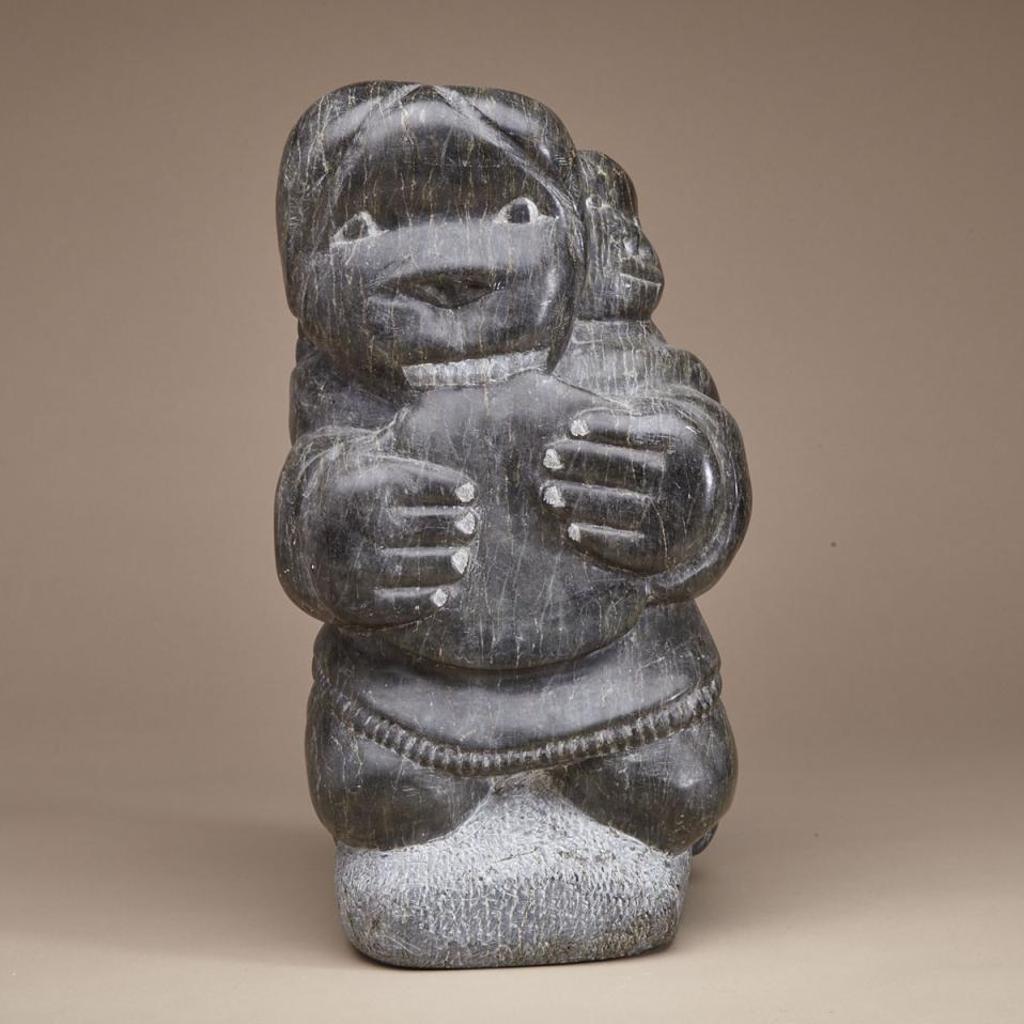 Johnny Inukpuk Jr. (1911-2007) - Woman Softening A Skin With Child In Her Amaut