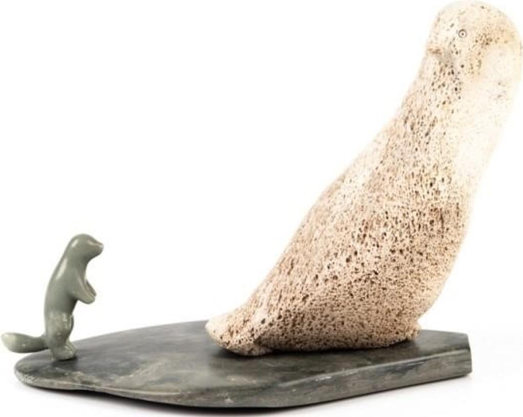 Nellie Kanovak Hikok (1911) - Carved sculpture of large bird and small animal in tableau on irregular-shaped stone base. Bird in pale porous stone. Animal and base in shades of green soapstone. Figures on posts and detachable