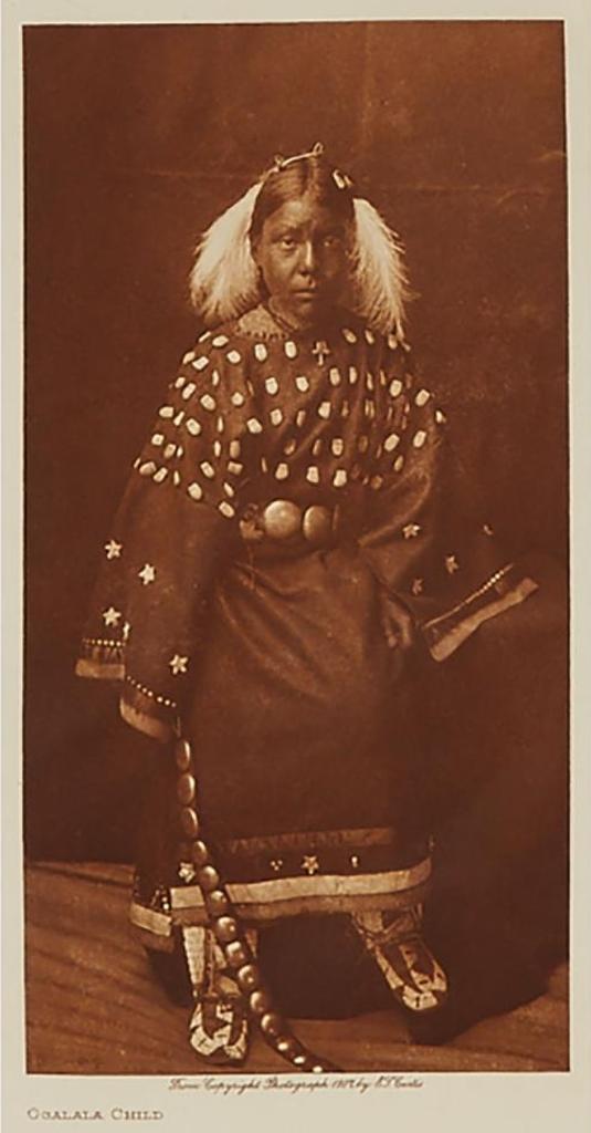 Edward Sherrif Curtis (1868-1952) - Good Lance - Ogalala, 1907; Ogalala Child, 1907; Elk Head, And The Sacred Pipe Bundle, 1907