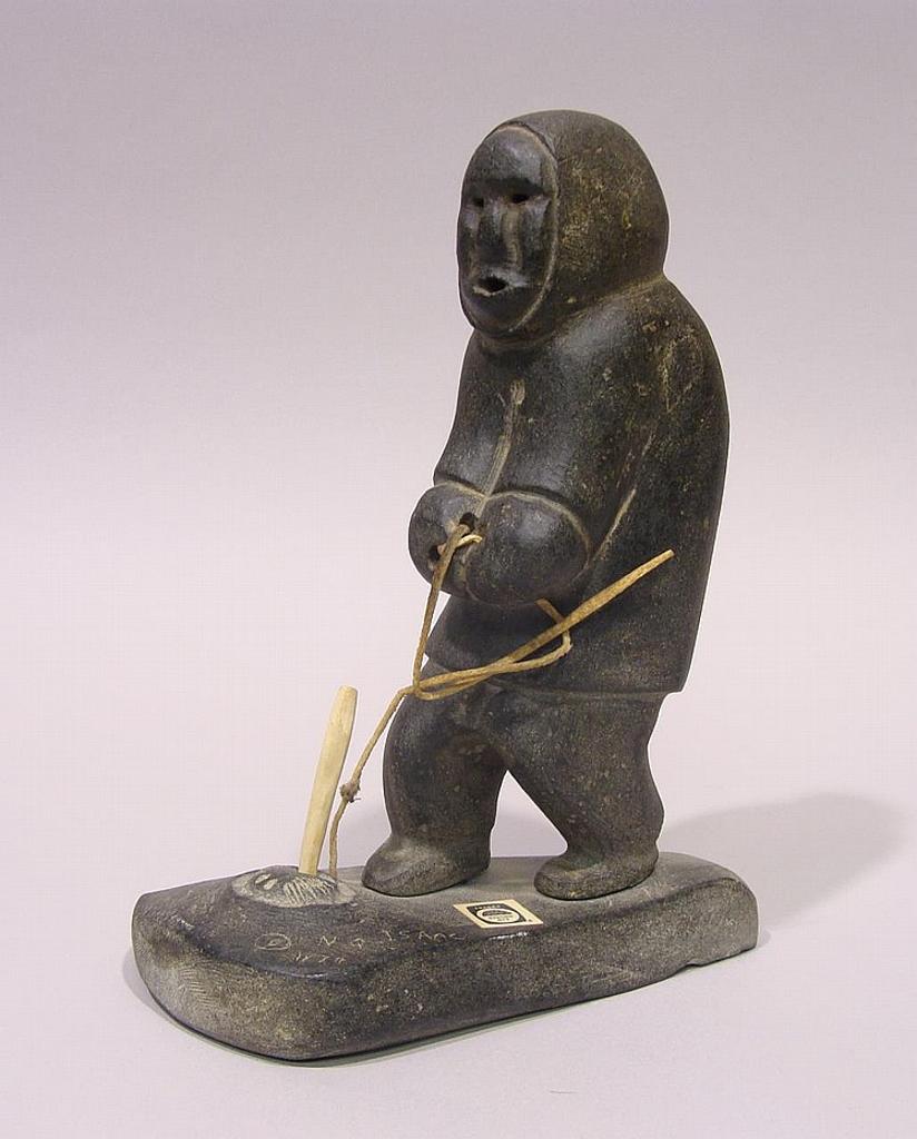 Isaac Naqtai (1930) - Resolute Bay a soapstone carving of a hunter with a spear signed NQ Isaac