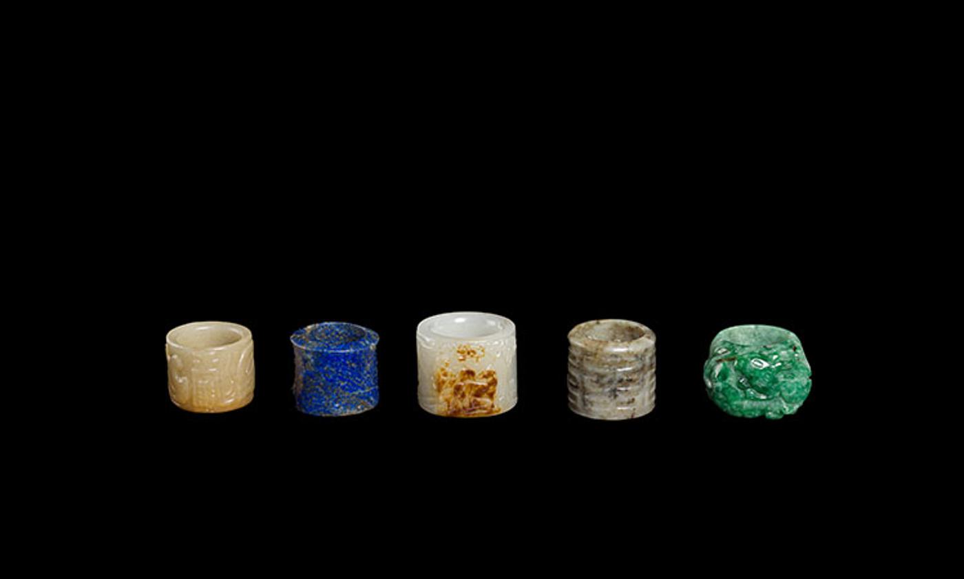 Chinese Art - Five Chinese Jade and Hardstone Archer’s Rings, 19th/20th Century