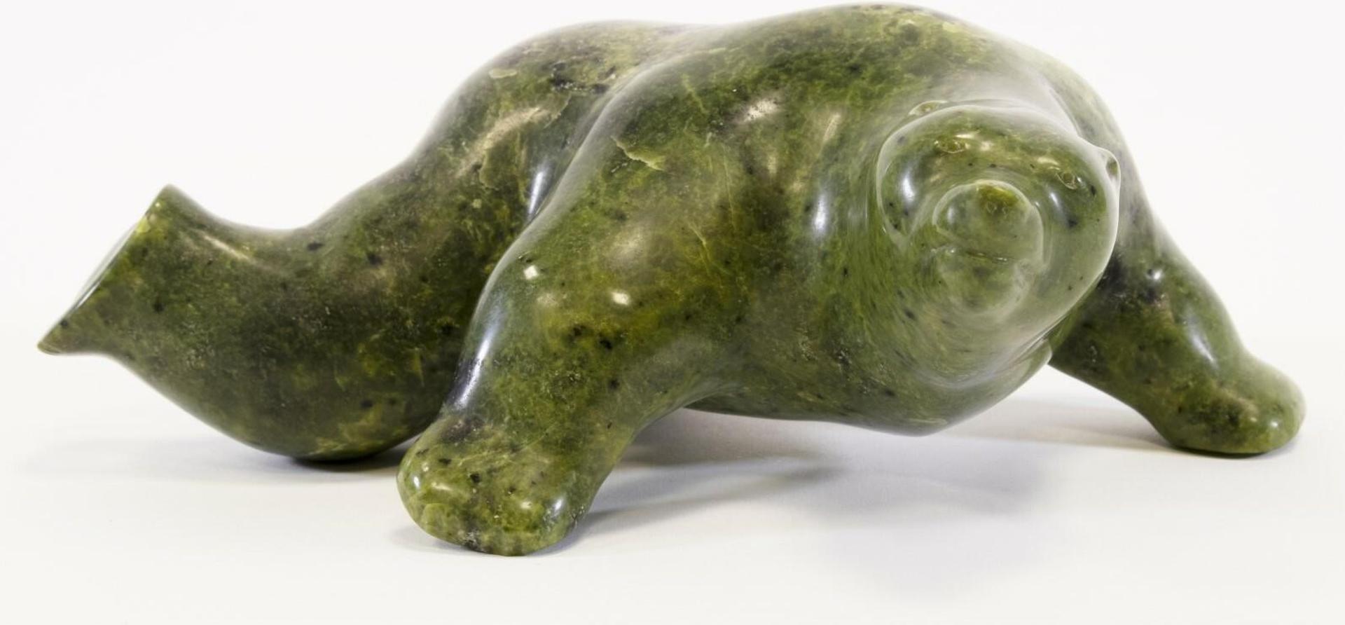 Johnny Manning (1956) - a serpentine carving of a Swimming Bear; with igloo card