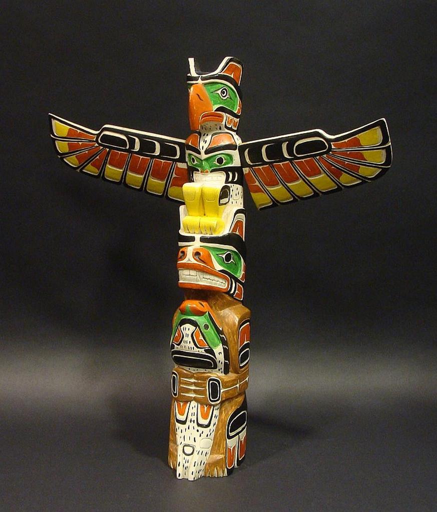 Oscar Matilpi (1933-1999) - a carved and polychromed totem pole depicting Thunderbird