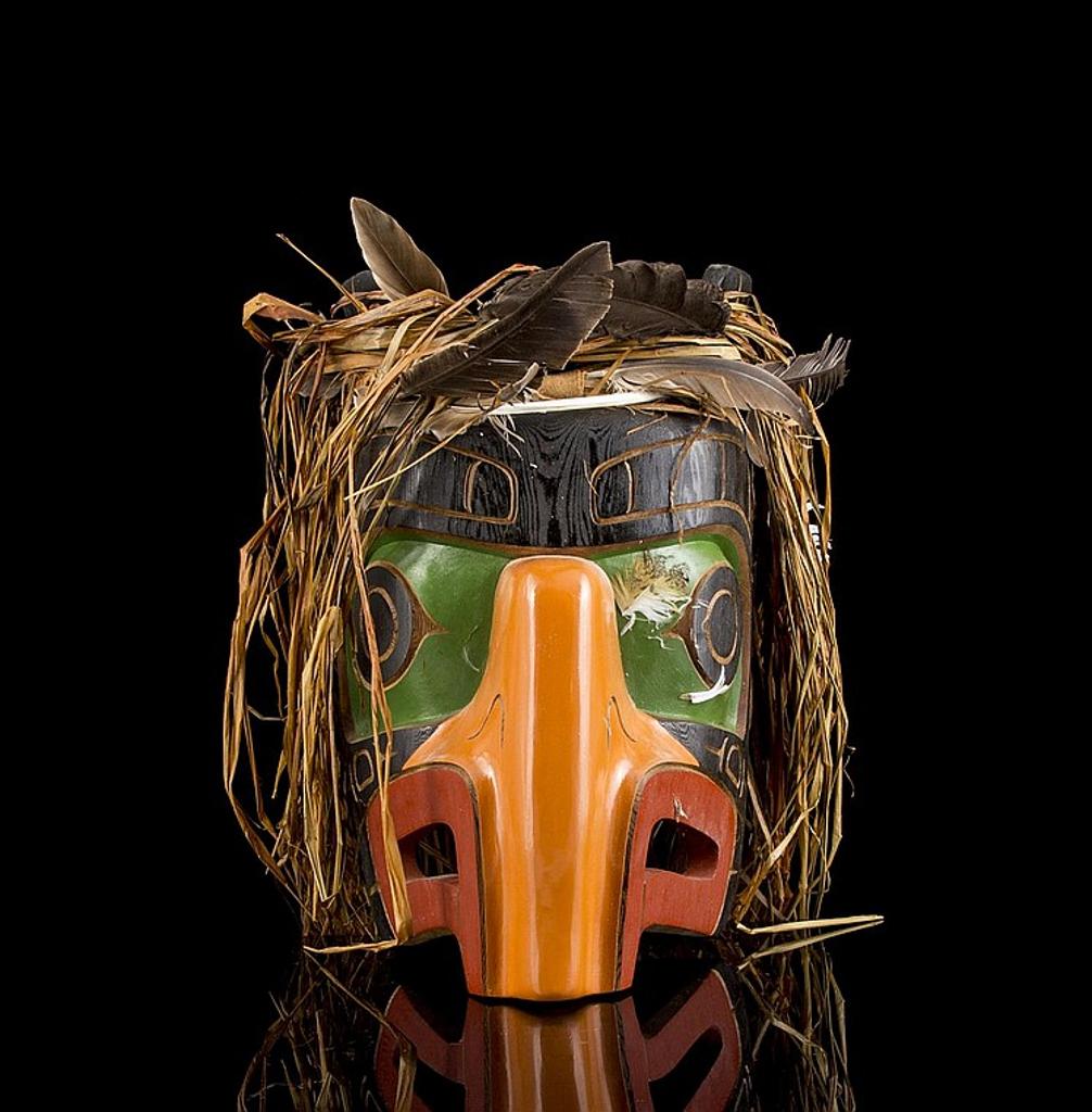 Cody Mathias - a carved and polychromed Thunderbird mask