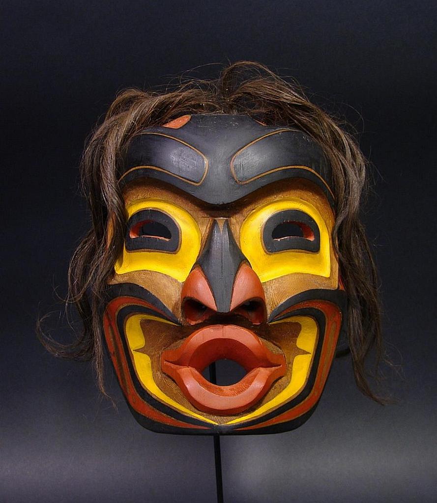 John E. Livingston (1951-2019) - a carved and polychromed red cedar Tsonokwa mask