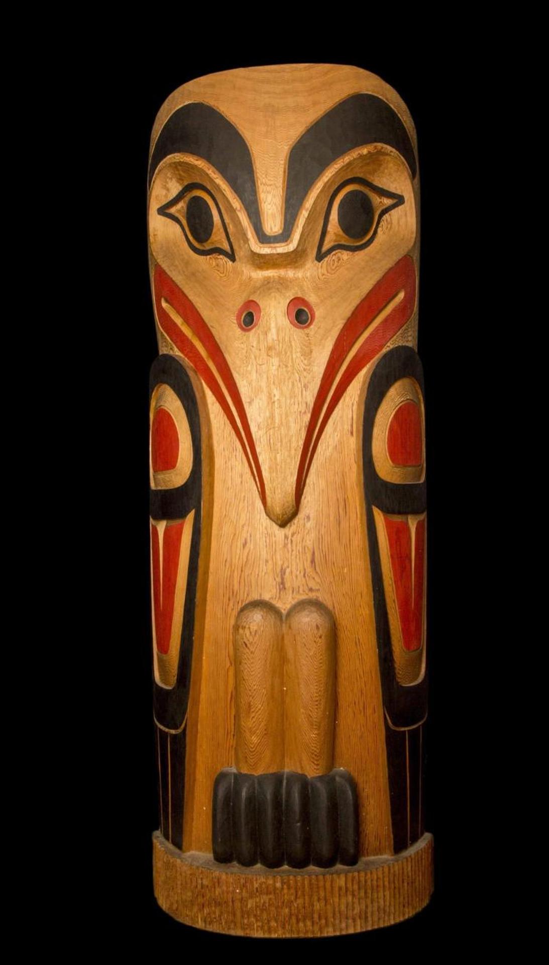 Jim Charlie (1967) - a carved and polychromed cedar Raven totem pole