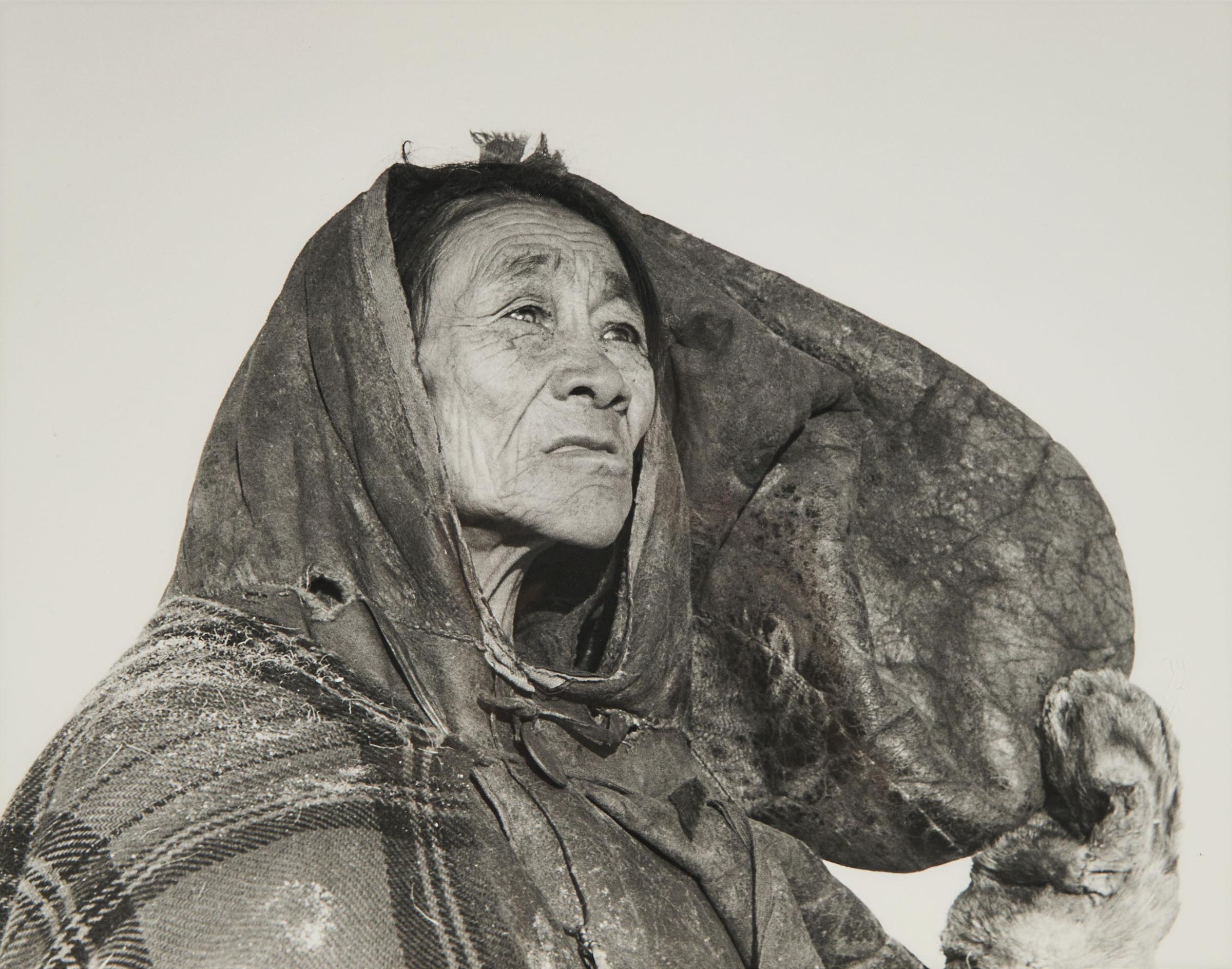 Richard Harrington (1911-2005) - A Gaunt Padlei Inuit Woman Near Death Due To Hunger - At Starvation Camp, Dressed In An Old Hairless 'artiggi' Inner Caribou Skin Parka, 1950