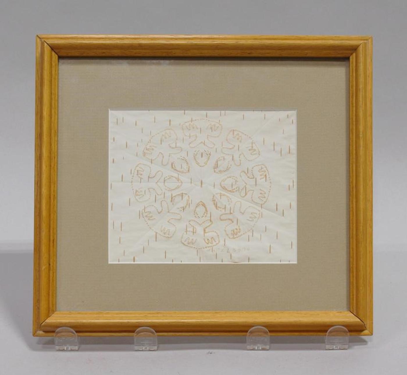 Angelique Merasty (1924-1996) - A framed birch bark biting (mazinibaganjigan) in a geometric design