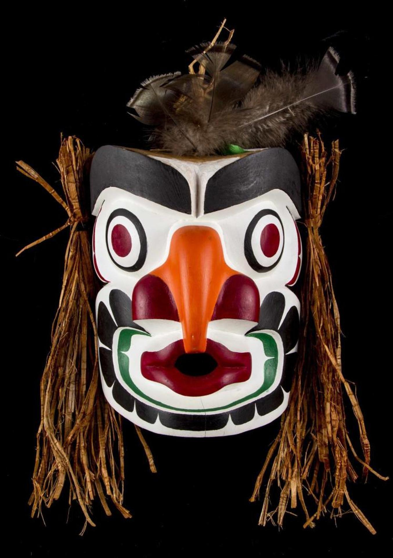 Vincent Moon - a carved and polychromed Grouse mask with feathers and cedar strip hair