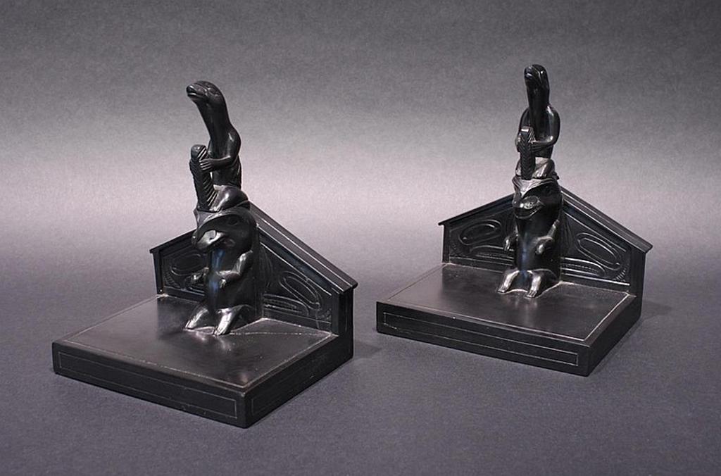 Rufus Moody (1923-1998) - a pair of argillite bookends in the form of house posts infront of long houses