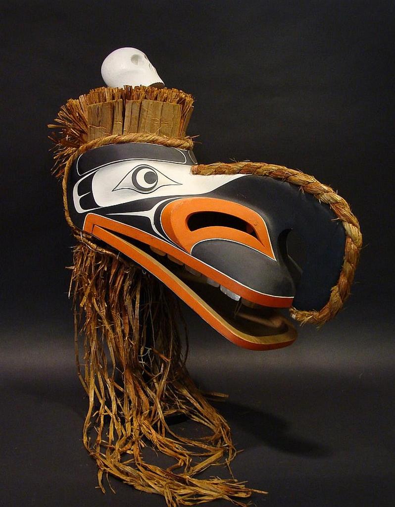 Gene Brabant - a carved and polychromed mask of a cannibal bird