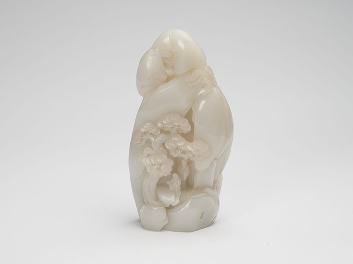 Chinese Art - A Finely Carved Chinese White Jade Mountain Landscape, 20th Century