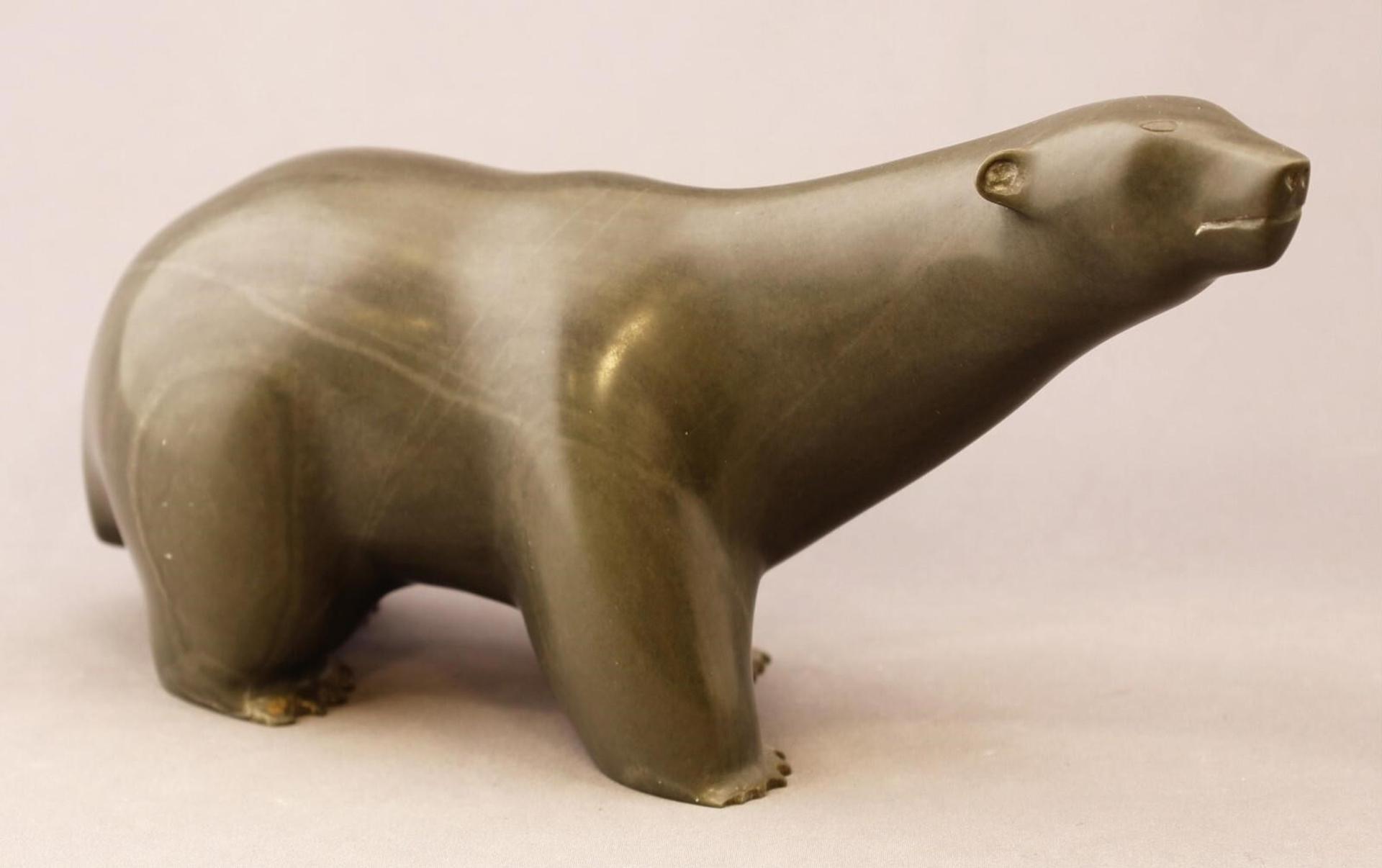 Isaac Appaqaq Apawkok (1953) - a grey stone carving of a Polar Bear