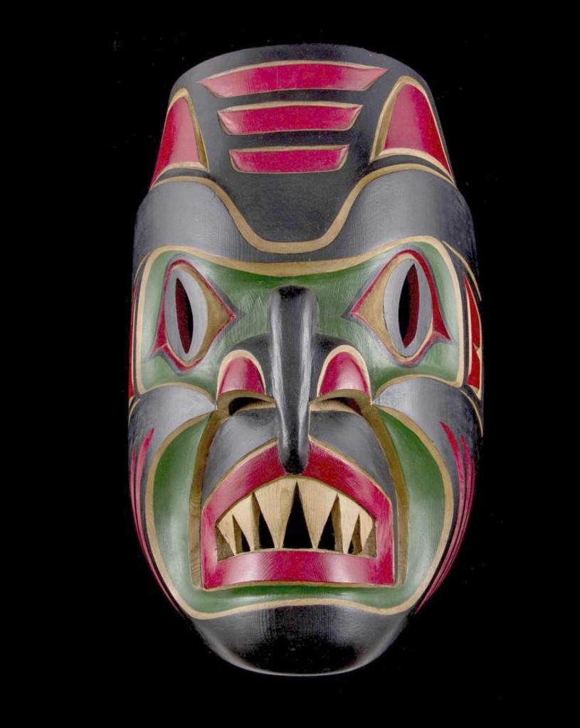 Harry T. Williams - a large carved and polychromed Dogfish mask painted in red