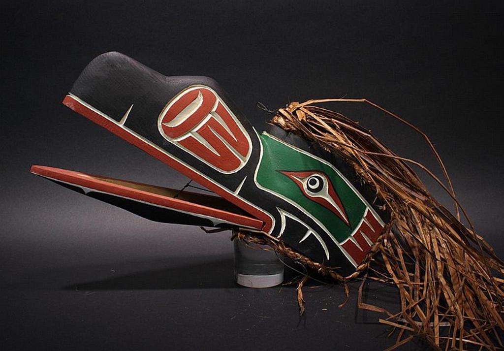Manny Georgeson - a carved and polychromed articulated Raven mask