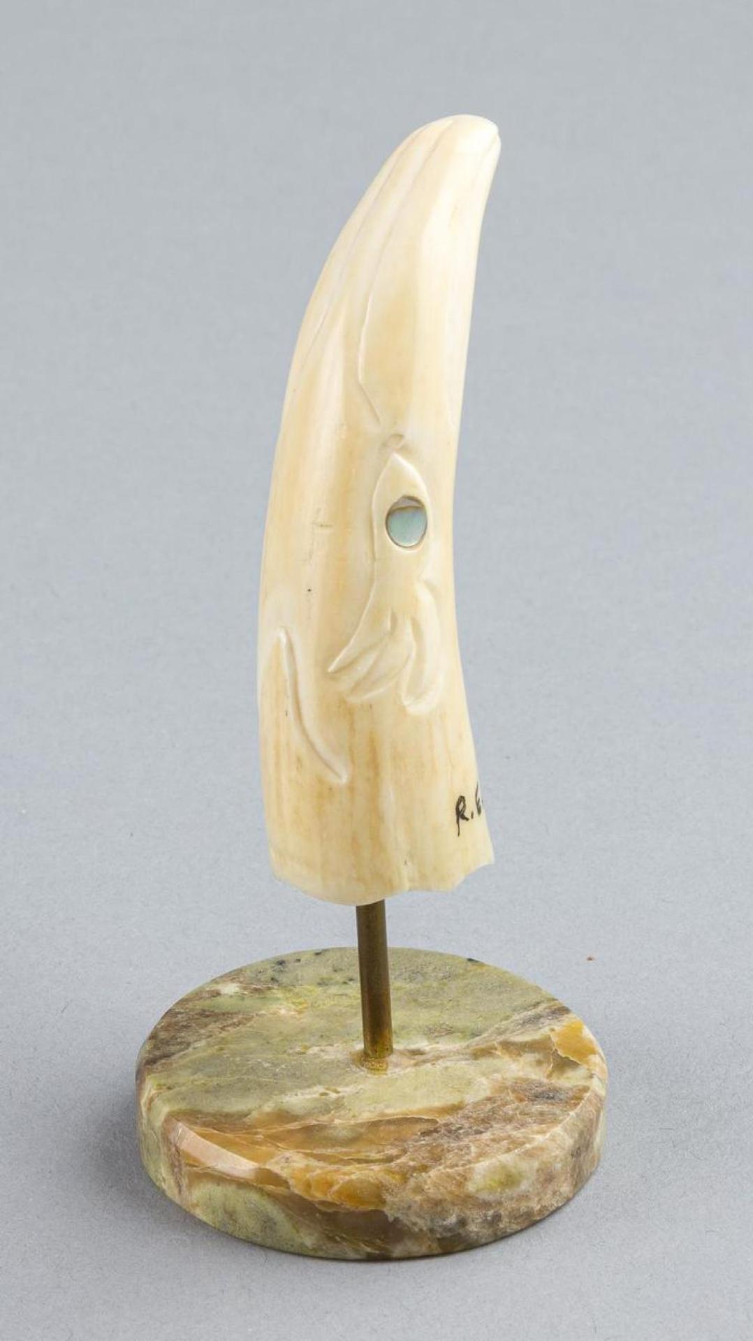 Rose Elsie John (1961) - a carved Whale's tooth in the form of an Eagle's head