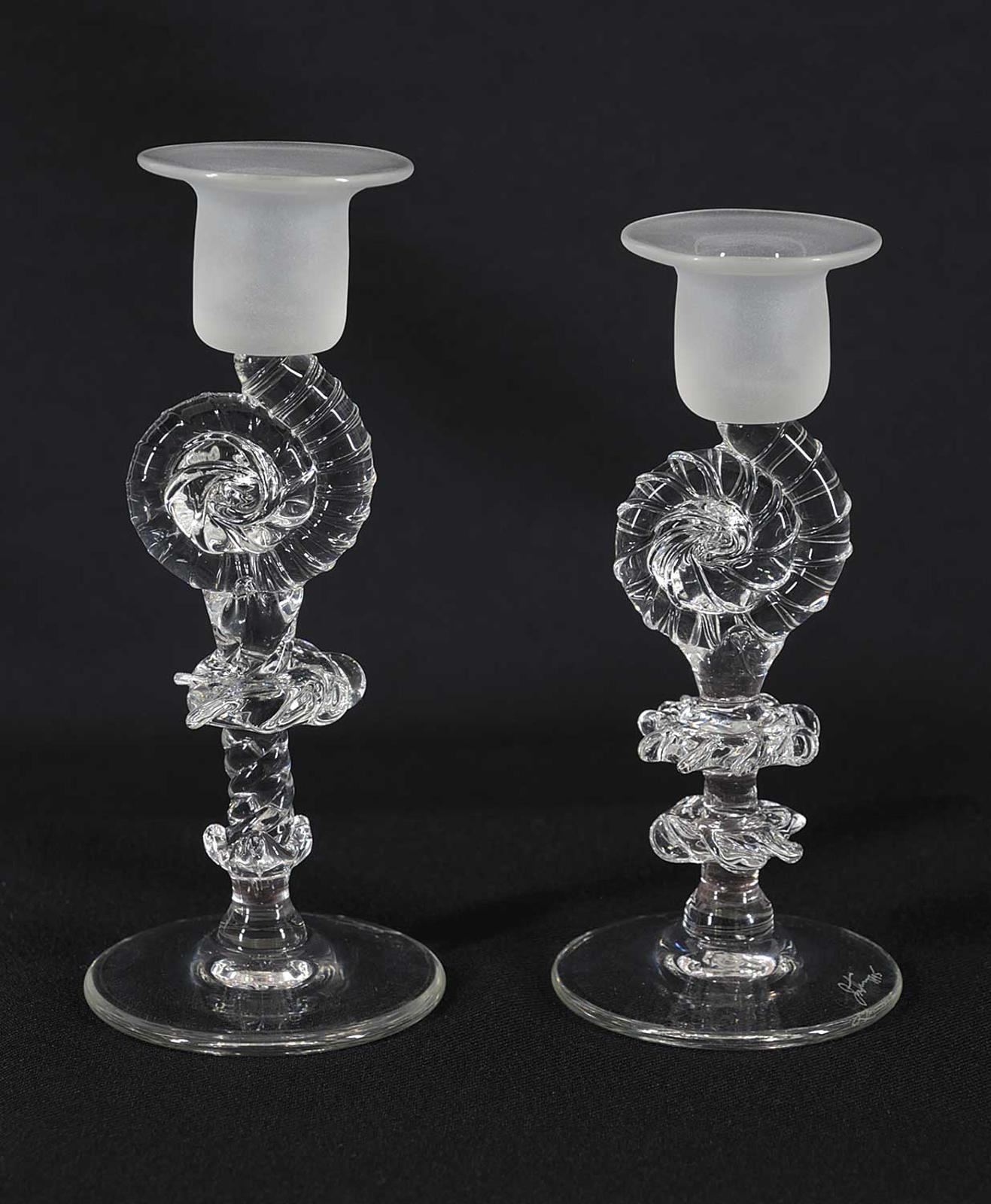 James [Jim] Norton - Lot of Two Ammonite Clear Glass Candle Sticks
