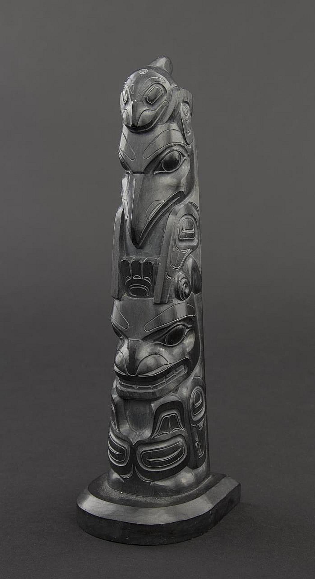 Robert Charles Davidson (1923) - a carved argillite totem pole depicting Killer whale
