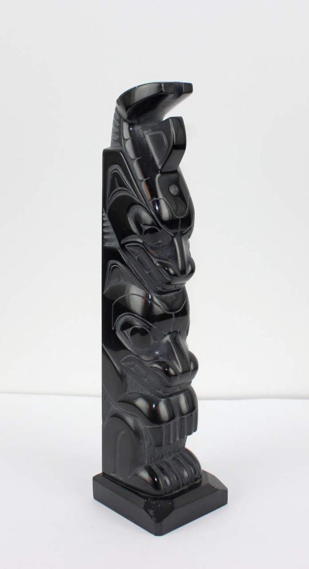 Denny Dixon (1944) - a carved argillite totem pole depicting Haida Killer Whale and Bear