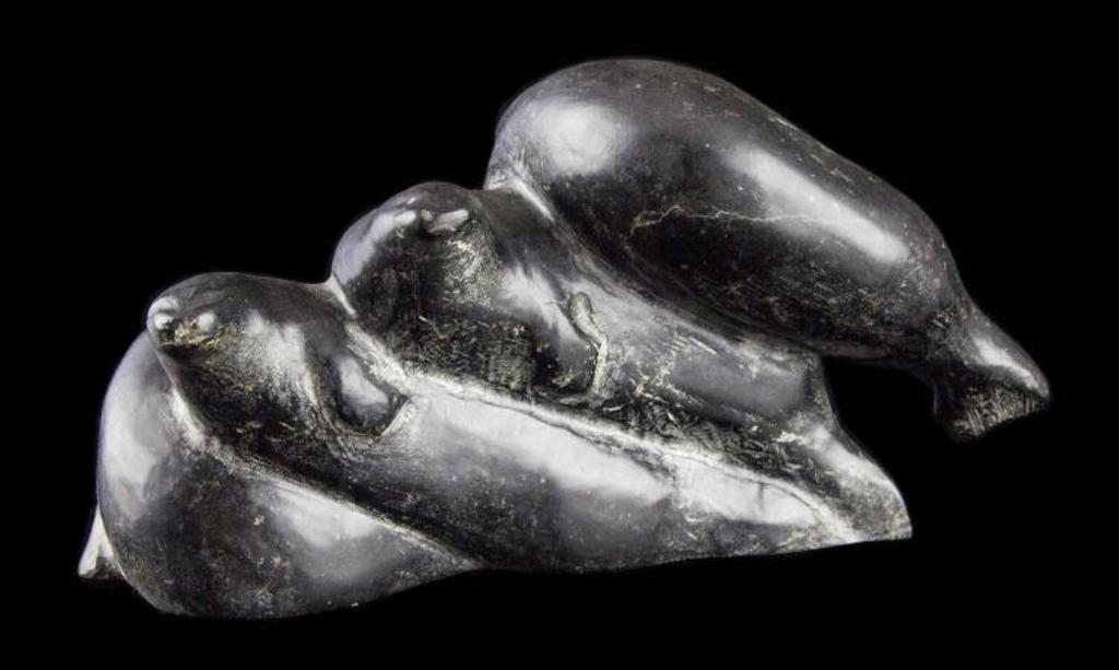 Simon Sigyareak - a black stone carving depicting four seals