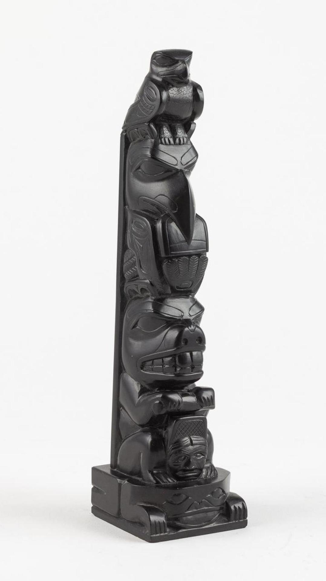 Tom Hans (1925) - a carved argillite totem pole