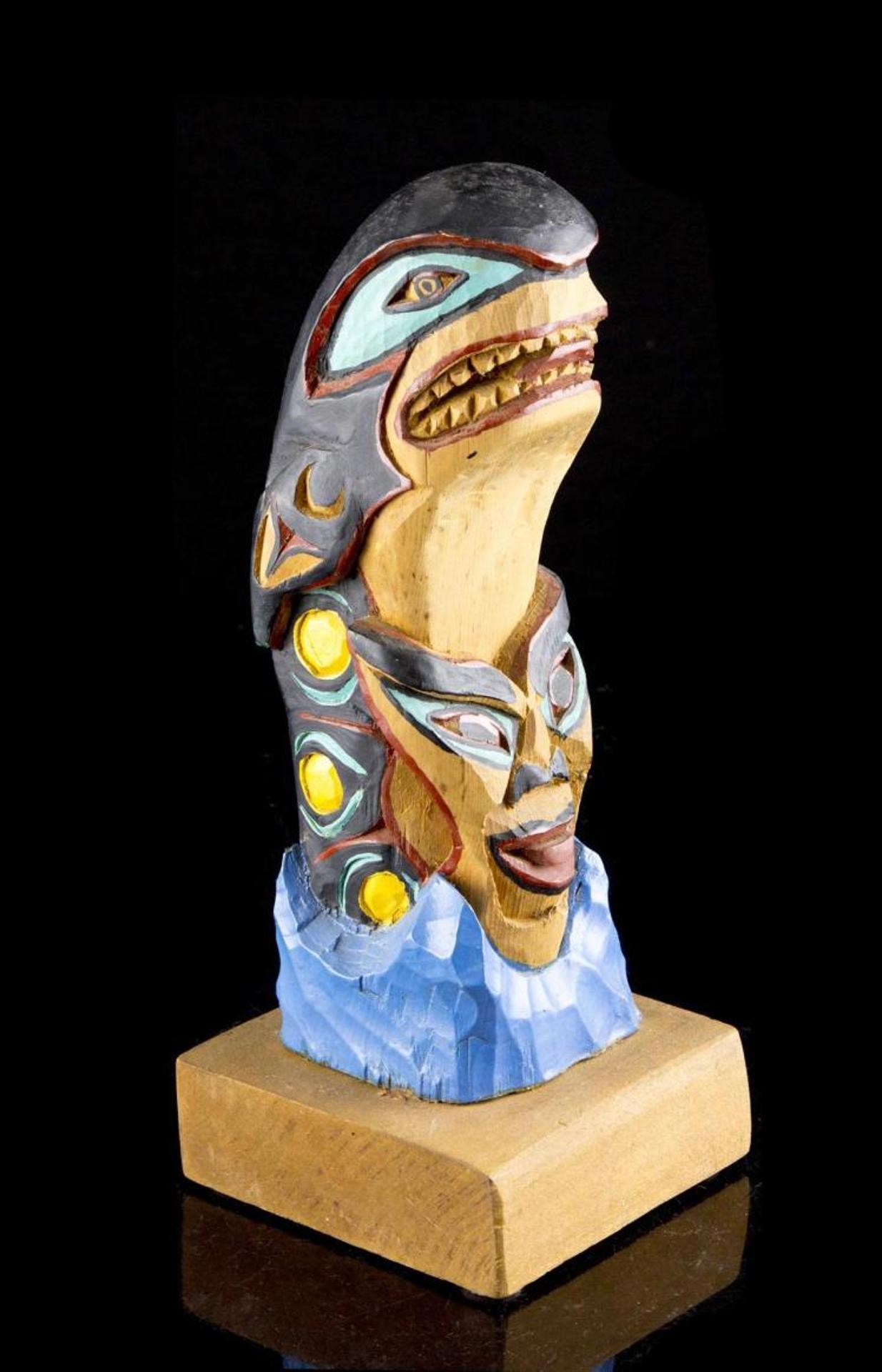 Simon Charlie (1919-2005) - a carved and polychromed totem pole depicting a Killer Whale