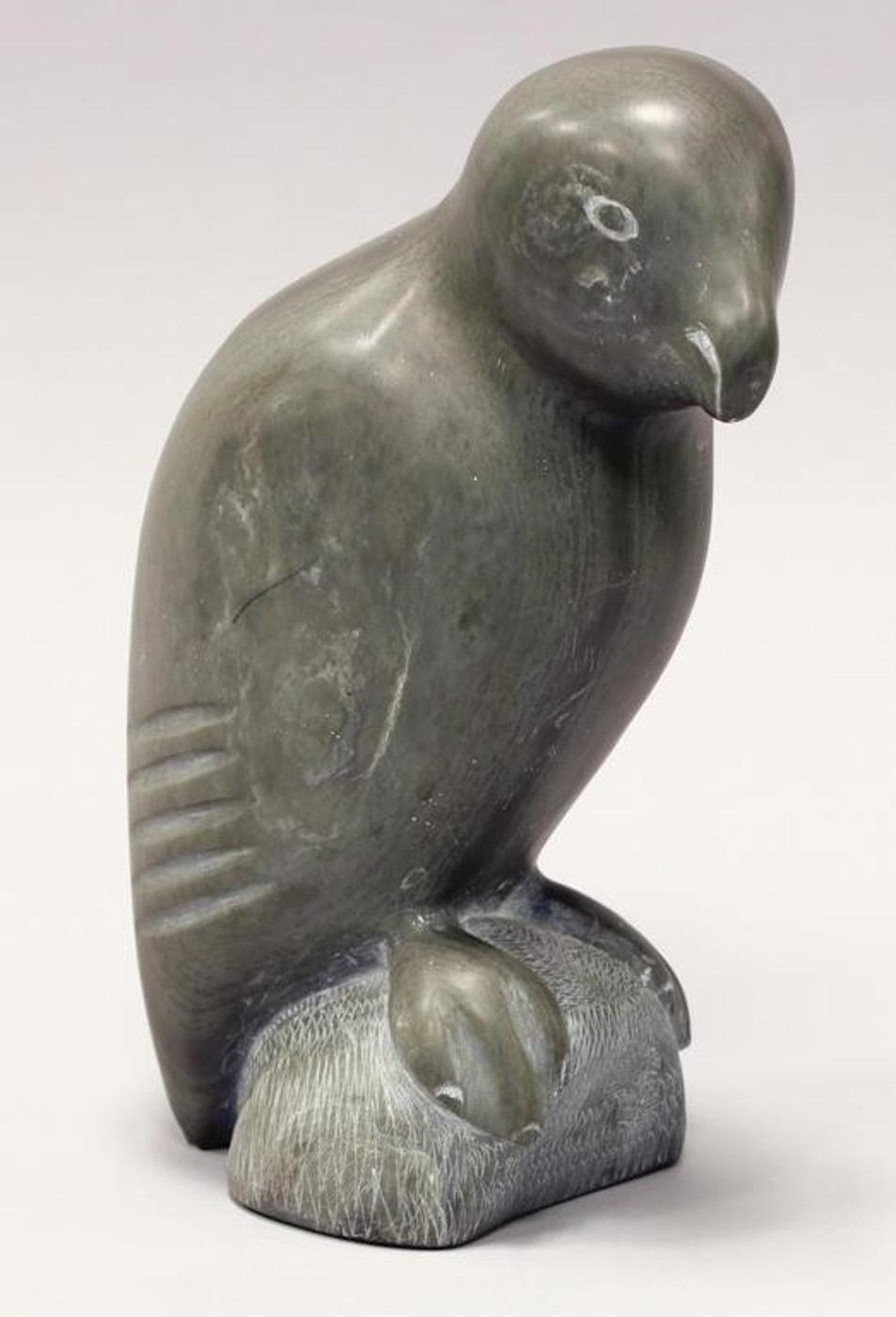 Pinny Pinnie Papialuk - Light grey-green stone carving of a Bird Perched on a Rock