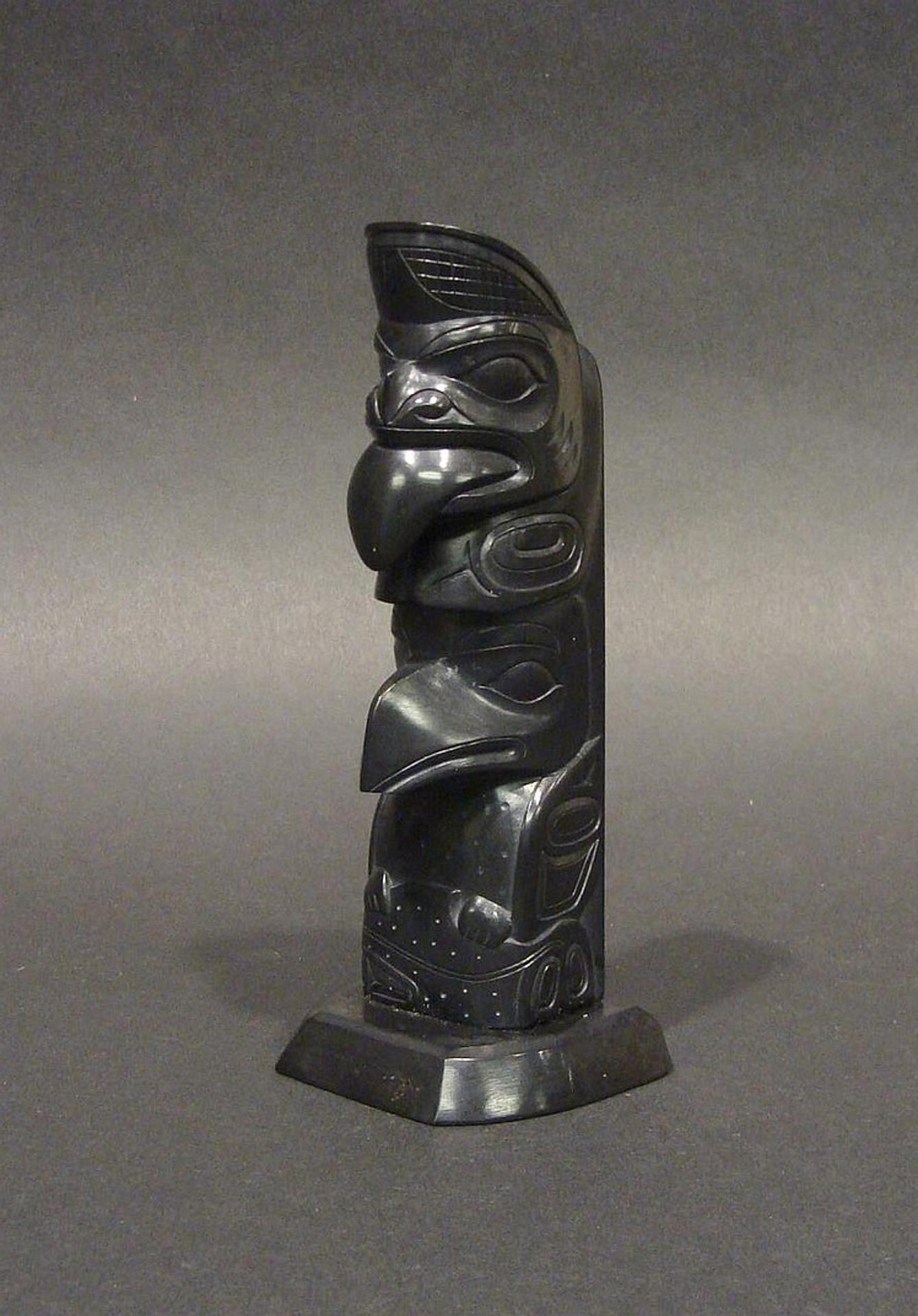 Robert Davidson and Sara Davidson (1946) - a carved argillite two figure pole depicting Whale and Raven