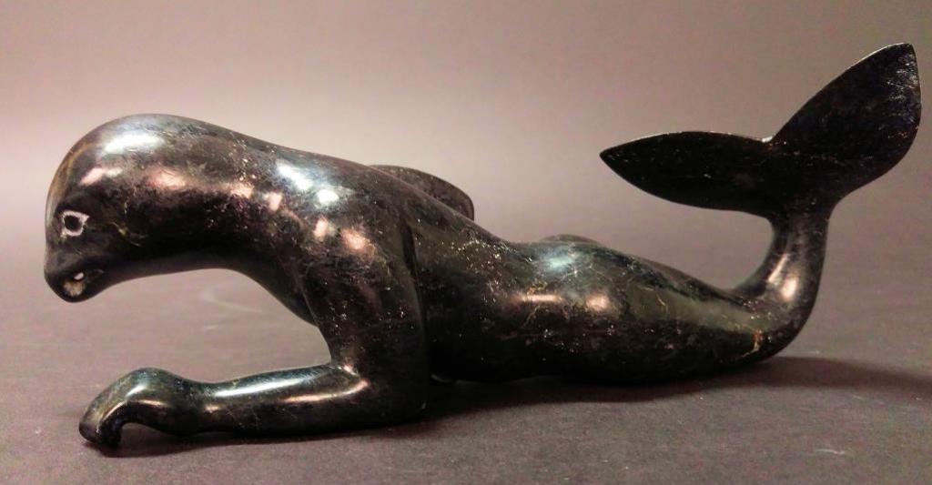 Oviloo Tunnillie (1949-2014) - Bird/ Whale Transformation, c. 1991, stone, 4 x 9 x 3 in. 10.2 x 22.9 x 7.6 cm. S-331