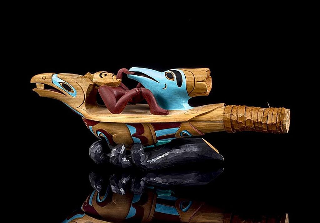 Wayne Carlick - a carved and polychromed Raven rattle