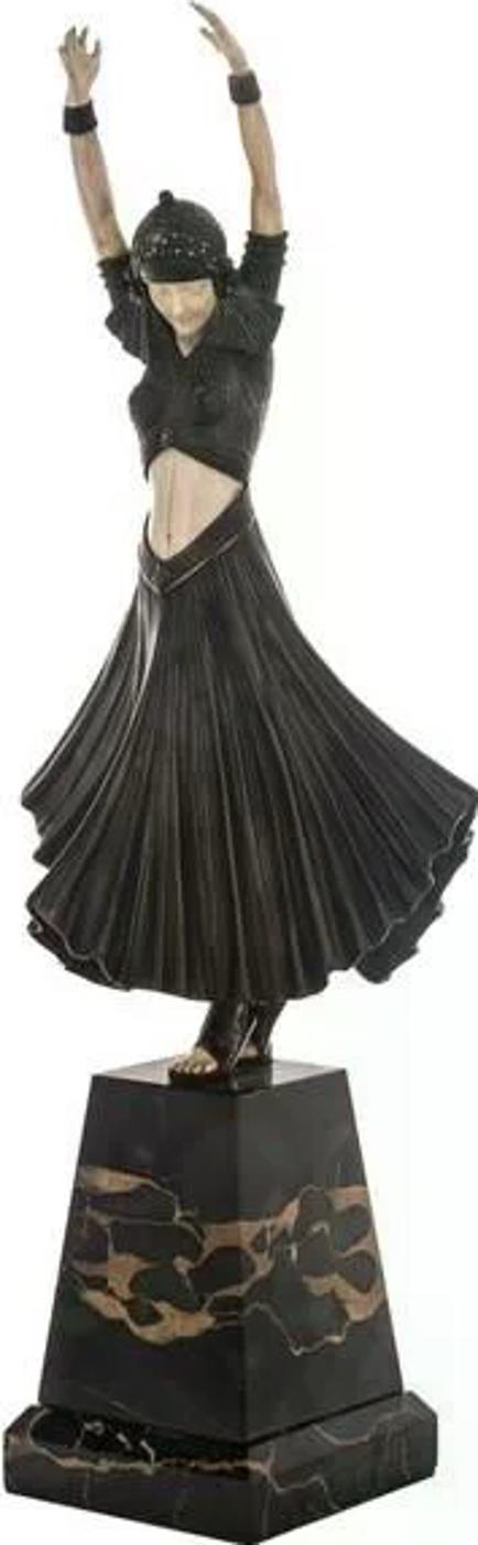 Demetre H. Chiparus (1888-1950) - Of a standing patinated bronze lady in Art Deco swing dress and hat