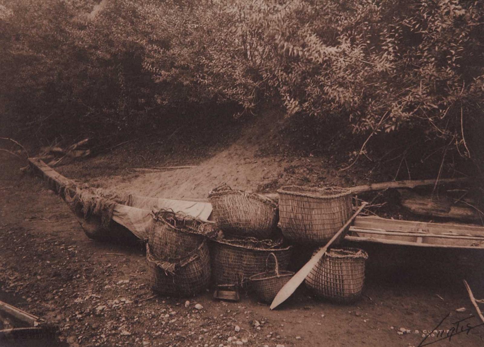 Edward Sherrif Curtis (1868-1952) - Untitled - Dugout Canoe with Baskets and Paddle