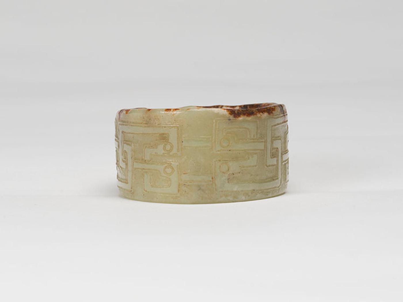 Chinese Art - A Chinese Celadon and Russet Tubular Jade Ornament, Possibly Neolithic with Later Carving