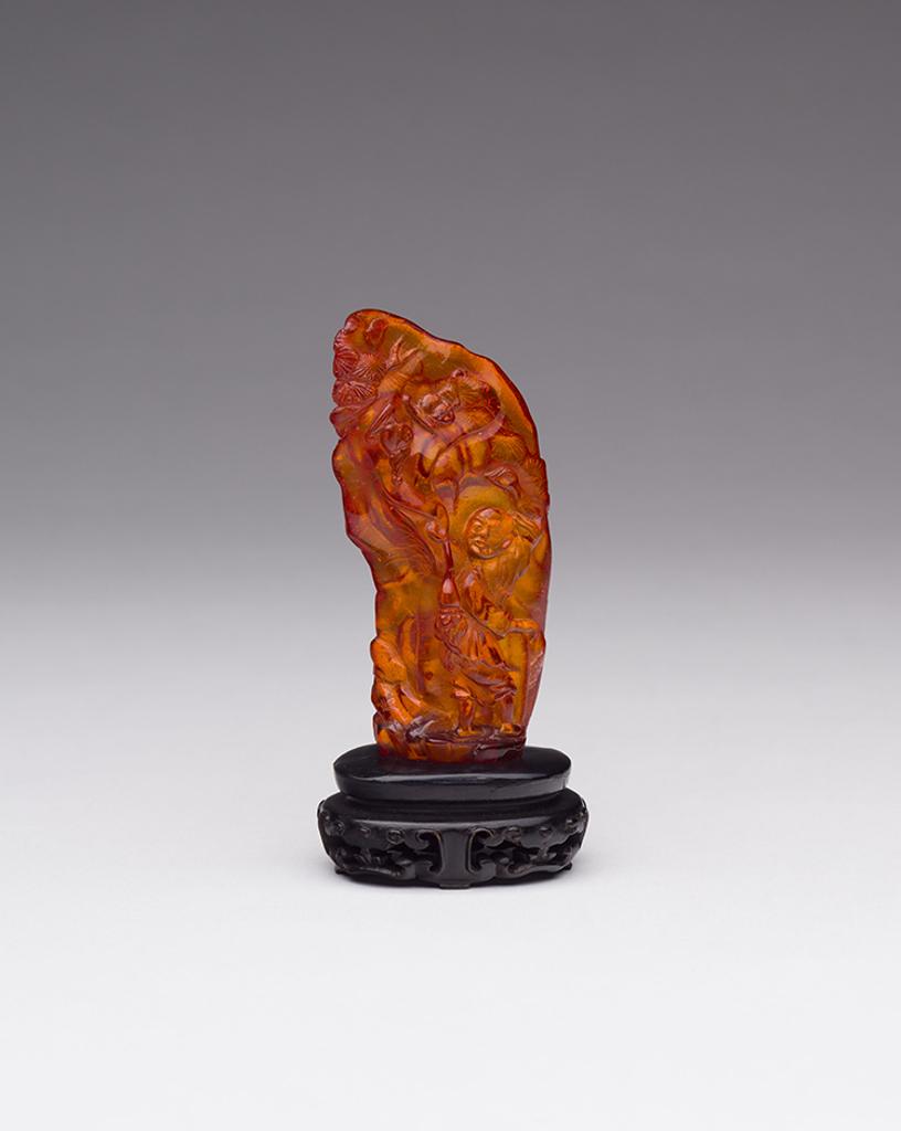 Chinese Art - A Chinese Amber Carved Immortal, 19th Century