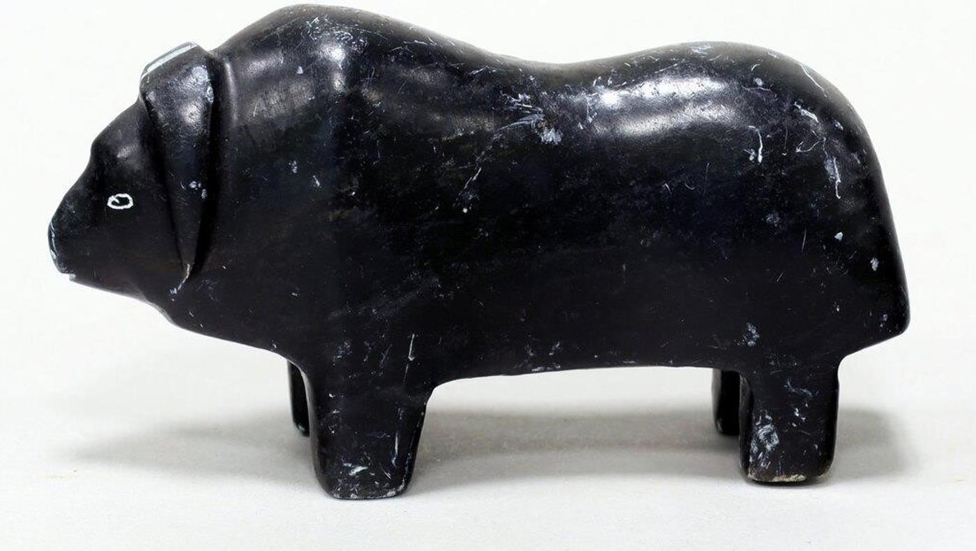 George Arlook Arluk (1949) - Black stone carving of a Muskox