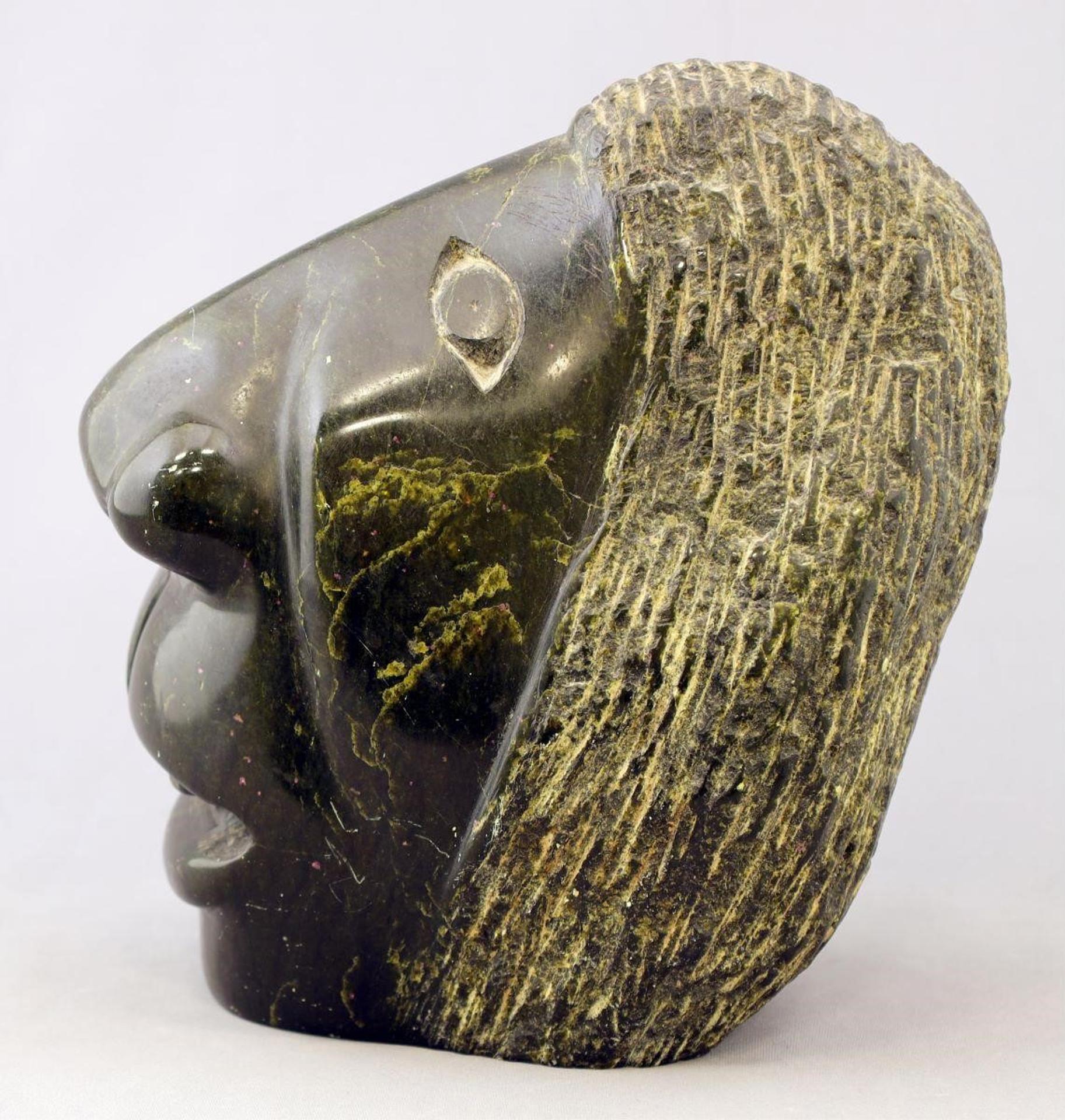 Mina Inuktaluk (1932) - a serpentine carving of a Face