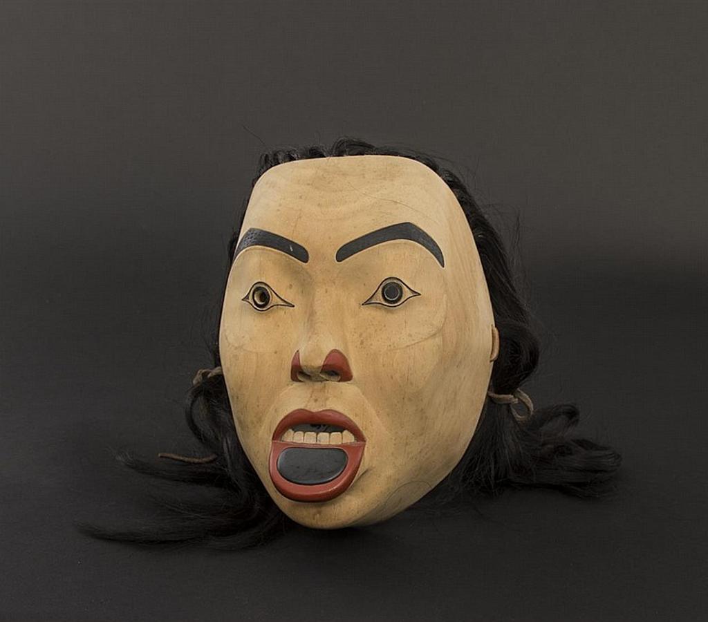 Dale Marie Campbell - a hand carved and polychromed woman's face mask