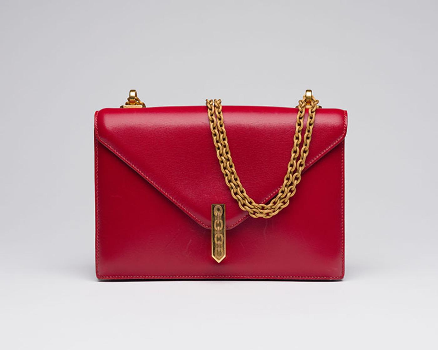 Hermès - A VINTAGE RED BOX ALCAZAR WITH GOLD HARDWARE
