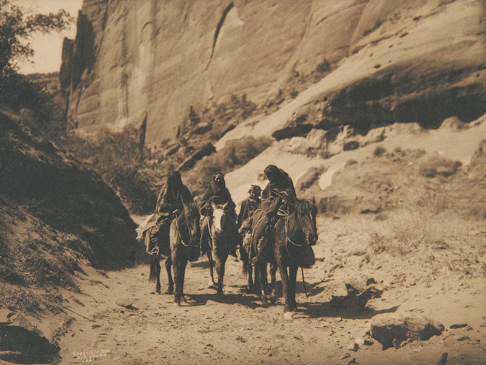 Edward Sherrif Curtis (1868-1952) - Three Mounted Navajo Women and Child on Horseback
