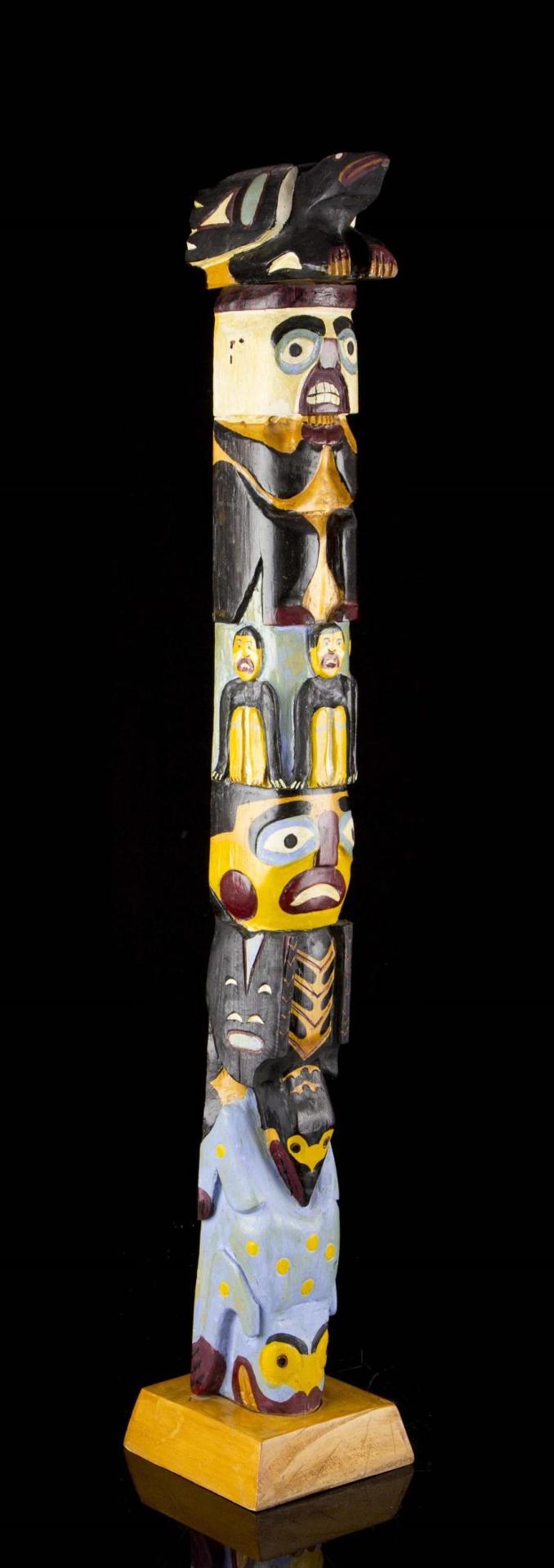 Charles Dudoward - a carved and polychromed totem pole