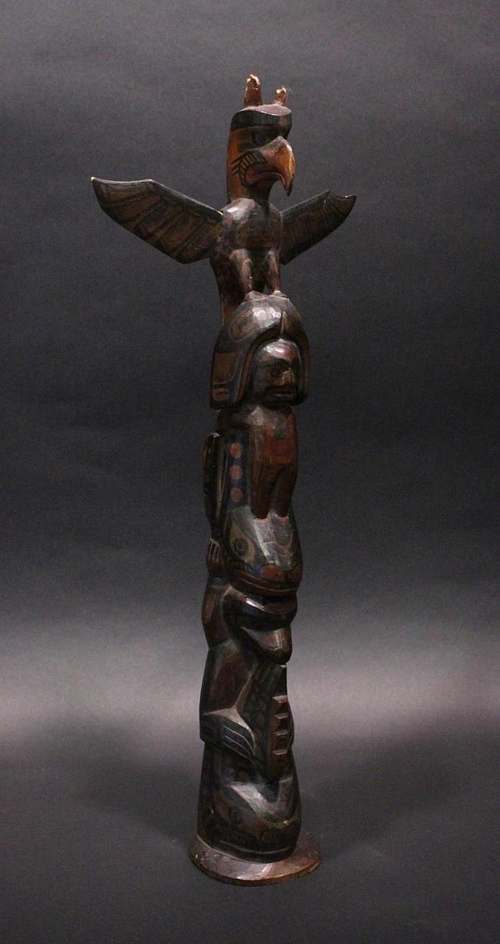 Charlie James (1865-1961) - a carved and polychromed pole depicting Thunderbird