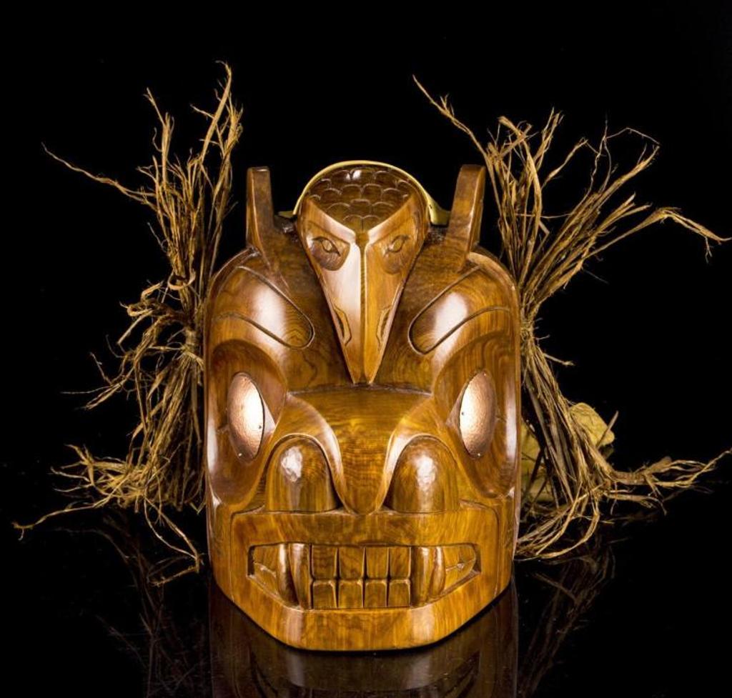 Derek Heaton - carved and stained cedar mask with copper eyes